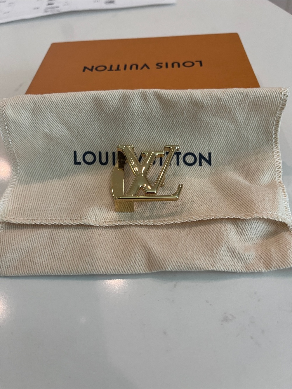 Louis Vuitton Gold LV Initials belt buckle